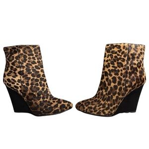 Women’s Leopard print Prada Wedge Boots. Made with pony hair! Size 36. 6W.